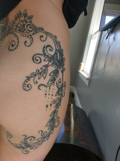 Explore arm tattoo ideas flowers, creative tattoo ideas in Sioux City, available at Thorn-Side Tattoo & Piercing