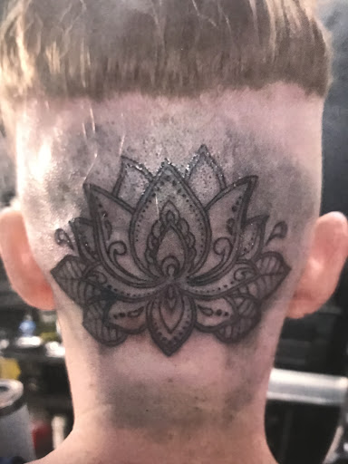 Explore cute spine tattoo ideas, creative tattoo ideas in San Angelo, available at Alchemy Tattoo and Piercing Studio