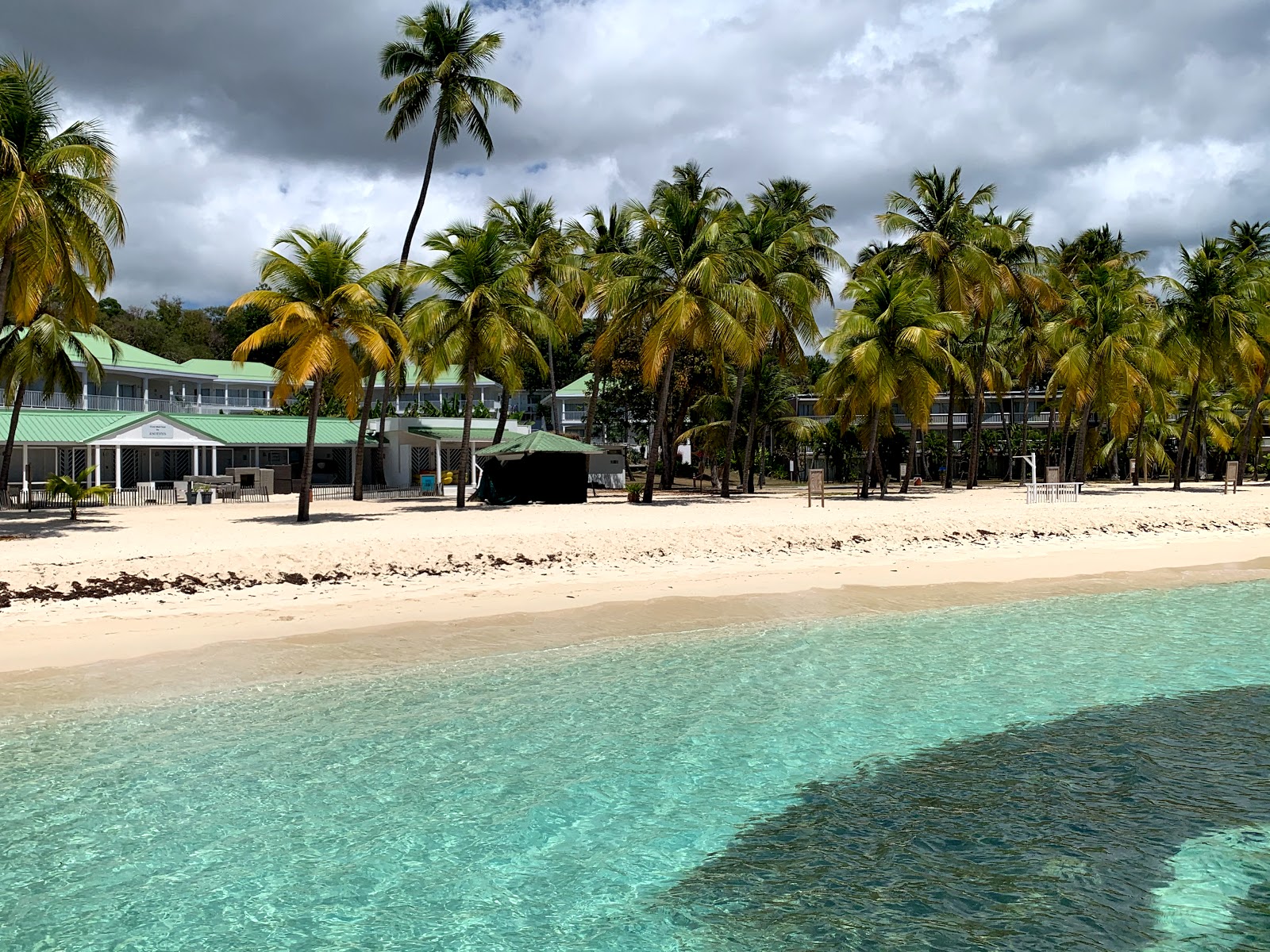 Foto de The Beach of Caravelle com água cristalina superfície