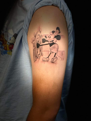 Explore dirty hands clean money tattoo ideas, creative tattoo ideas in Cocoa Beach, available at The Corner Tattoo and Piercing Studio