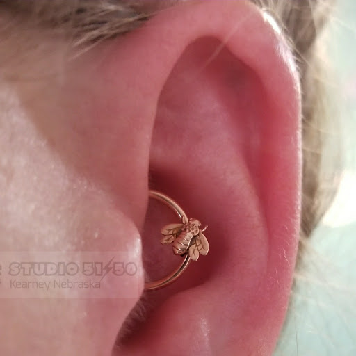 Explore tattoo ideas hand, creative tattoo ideas in Kearney, available at Studio 5150 Piercing & Fine Jewelry