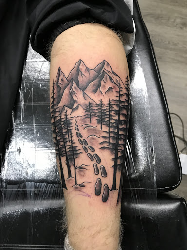 Find tattoo ideas with trees for your next unique tattoo in Winter Park at Black Pine Tattoo