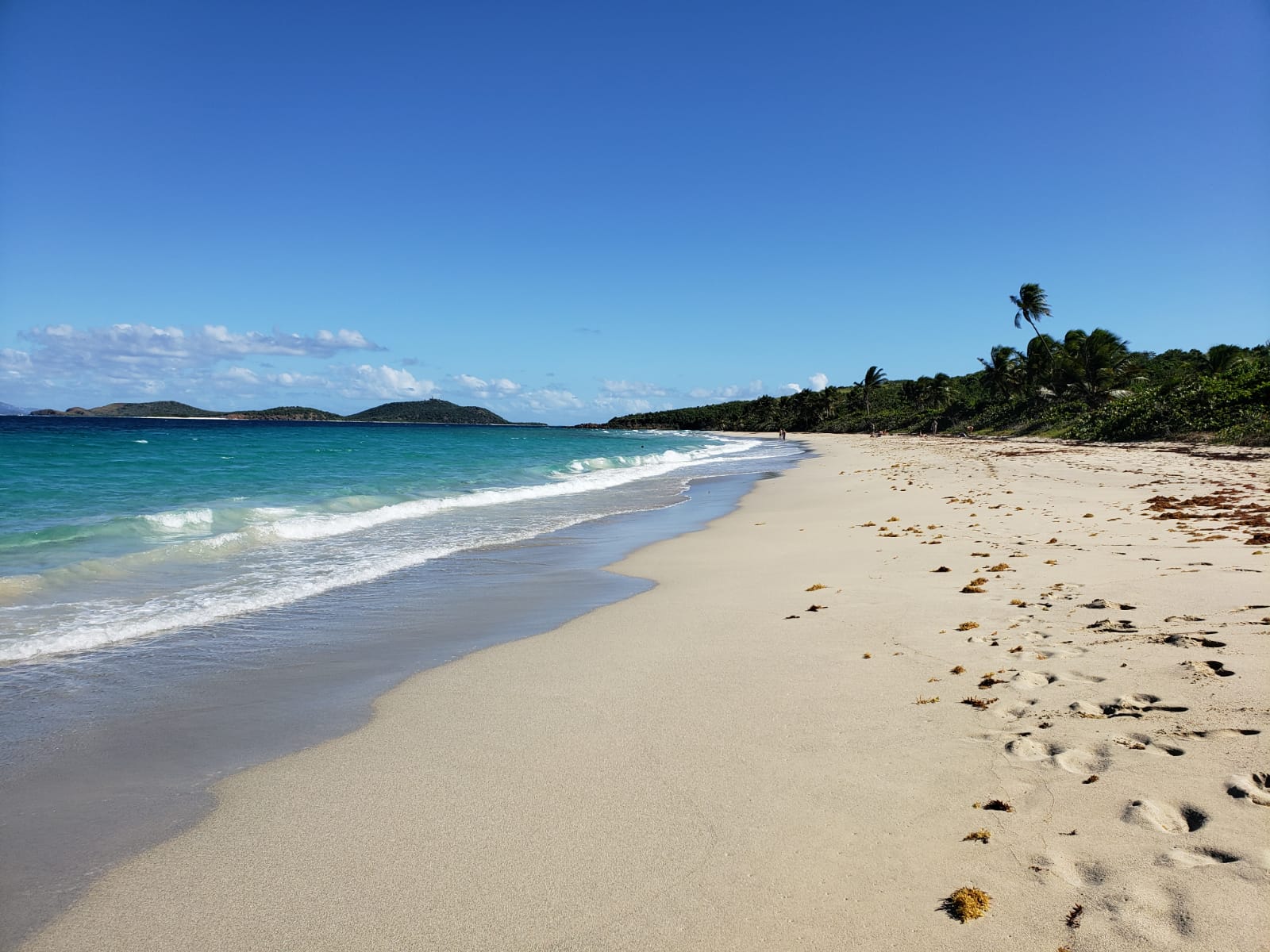 Foto van Zoni beach met beige zand oppervlakte
