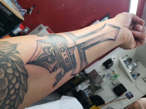 Explore star tattoo cover up ideas, creative tattoo ideas in La Habra, available at Raining Ink Tattoo Studio