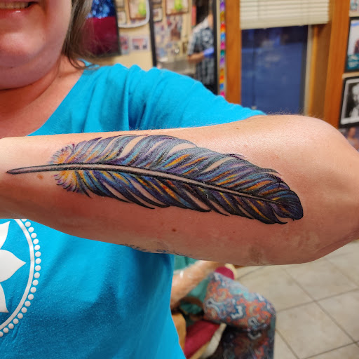 Explore flower back tattoo ideas, creative tattoo ideas in Marshall, available at Natural Canvas Tattoo