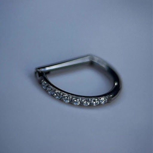 Find tattoo ideas for under the breast for your next unique tattoo in Miami at Asere My Piercing