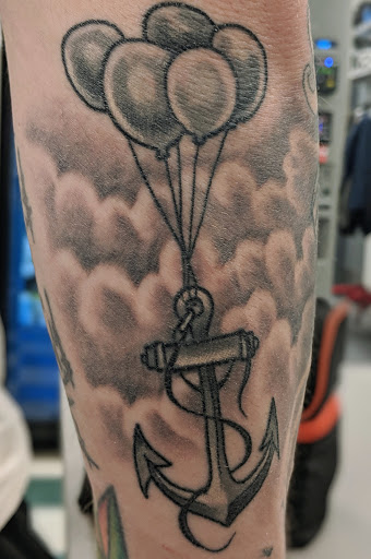 Explore simple men tattoo ideas, creative tattoo ideas in Erie, available at Wayward Tattoo Studio