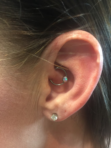 Explore cross tattoo ideas for females, creative tattoo ideas in Mount Juliet, available at Division Street Tattoo Company