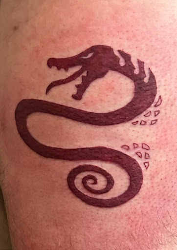 Explore script tattoo ideas for men, creative tattoo ideas in Sioux City, available at Asawolf Viking Tattoo
