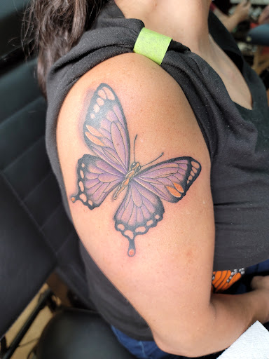 Explore swallow tattoo ideas, creative tattoo ideas in Fernley, available at Speakeasy Tattoo Co.