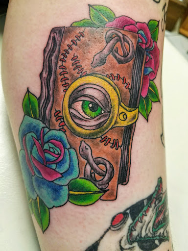 Explore traveler tattoo ideas, creative tattoo ideas in Johnstown, available at Screaming Needle Tattoo & Body Piercing