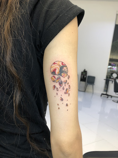 Explore simple tattoo outline ideas, creative tattoo ideas in Orange, available at Baron Art Tattoo