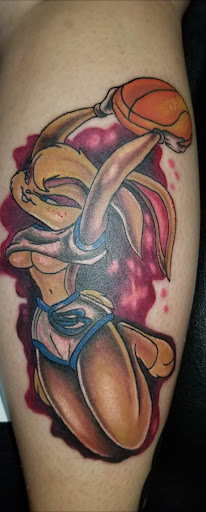 Explore punk tattoo ideas, creative tattoo ideas in Angola, available at Hoodlum Ink