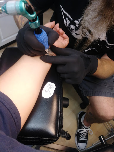 Explore animal lover tattoo ideas, creative tattoo ideas in Anniston, available at Infinity Ink