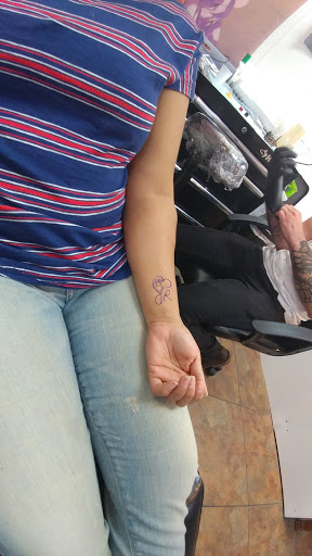 Explore woman face tattoo ideas, creative tattoo ideas in Downingtown, available at M & M Tattooing