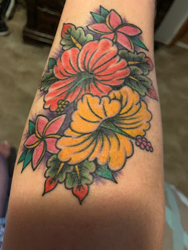 Explore father and son tattoos ideas, creative tattoo ideas in Honolulu, available at Sacred Art Tattoo Waikiki
