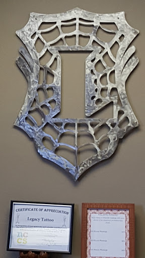 Find female breast tattoo ideas for your next unique tattoo in Ogden at Legacy Tattoo