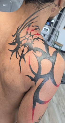 Explore military sleeve tattoo ideas, creative tattoo ideas in Manchester, available at Sacred Heart Tattoos