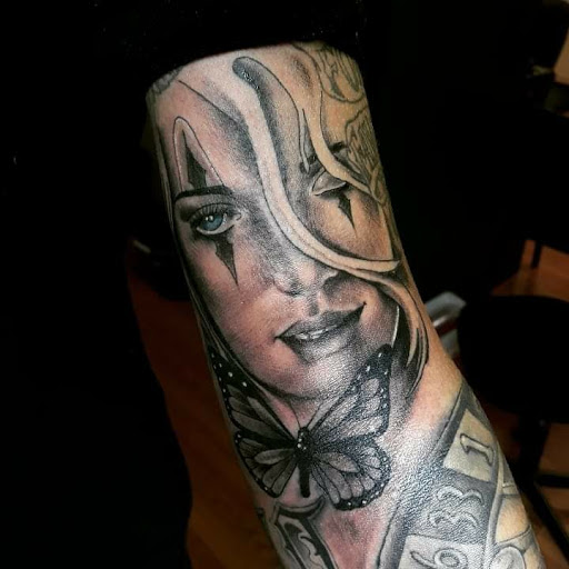 Find flower thigh tattoo ideas for your next unique tattoo in Arizona City at AZ City Tattoo & Art Studio