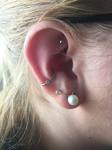 Explore hiking tattoo ideas, creative tattoo ideas in West Fargo, available at Addictions Collective Studios