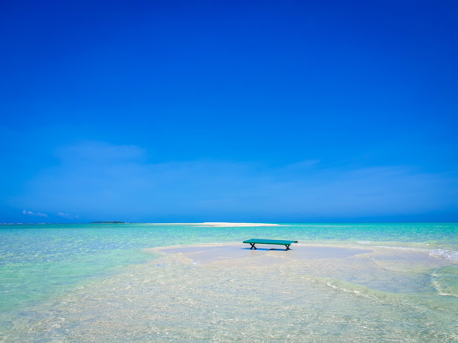 Photo of Dhidhdhoo Island Beach with turquoise pure water surface