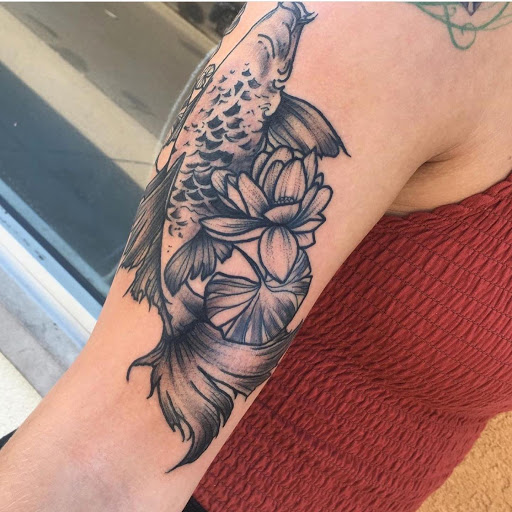 Explore electricity tattoo ideas, creative tattoo ideas in Dayton, available at 33 Lions Tattoo