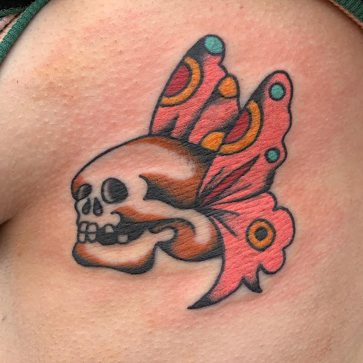 Find tattoo ideas crown for your next unique tattoo in Albuquerque at Holy Fool Tattoo Club