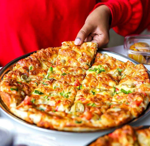 بيتزا وفطائر تاكو 