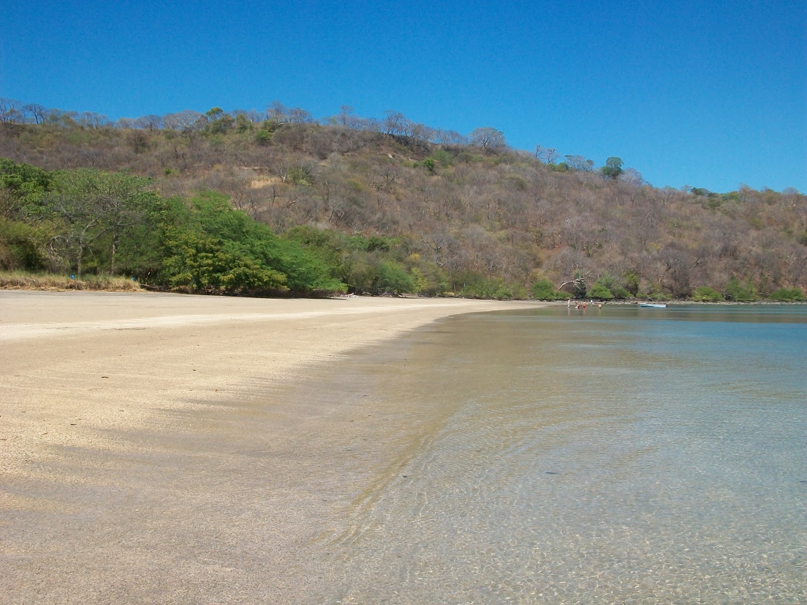 Nacascolo beach'in fotoğrafı uçurumlarla desteklenmiş
