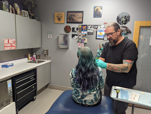 Find surrealism tattoo ideas for your next unique tattoo in Anchorage at the Hole Look