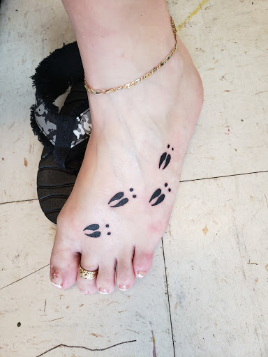 Explore feminine sleeve tattoo ideas, creative tattoo ideas in Statesville, available at Tattoo Factory of Statesville