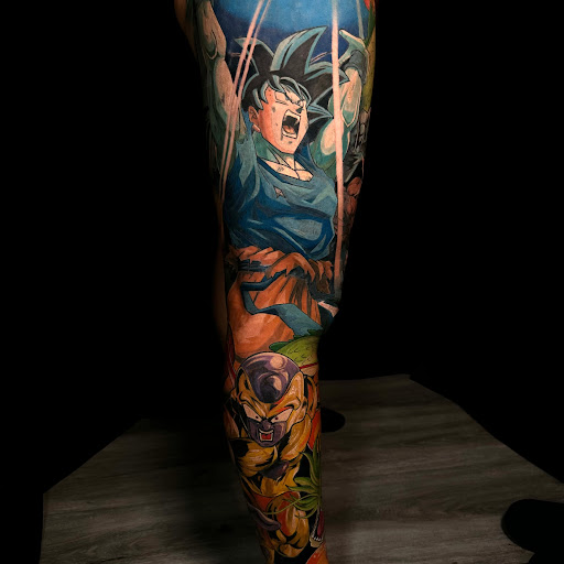 Explore thigh tattoo ideas for women, creative tattoo ideas in Norcross, available at Brotherhood Tattoo