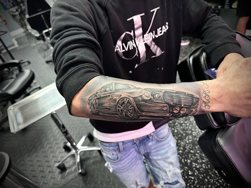 Explore anime tattoo sleeve ideas, creative tattoo ideas in Fort Myers, available at Loyal 2 The Coil Tattoos & Piercings (Edison Mall Location Entrance F)