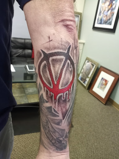 Explore religious tattoo sleeve ideas, creative tattoo ideas in La Crosse, available at Living Canvas Custom Tattoos