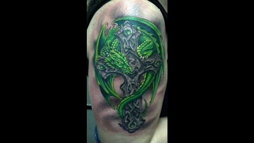Explore dagger tattoo ideas, creative tattoo ideas in Overland Park, available at Aftershock Tattoo Co.