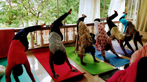 Ena's Yogic Healing Yog Institute,. Registered by world yoga organization.