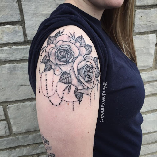 Find small joker tattoo ideas for your next unique tattoo in Mchenry at Art and Soul Tattoo Company