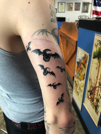 Explore thigh tattoo ideas male, creative tattoo ideas in Colorado Springs, available at Leftys Tattoo