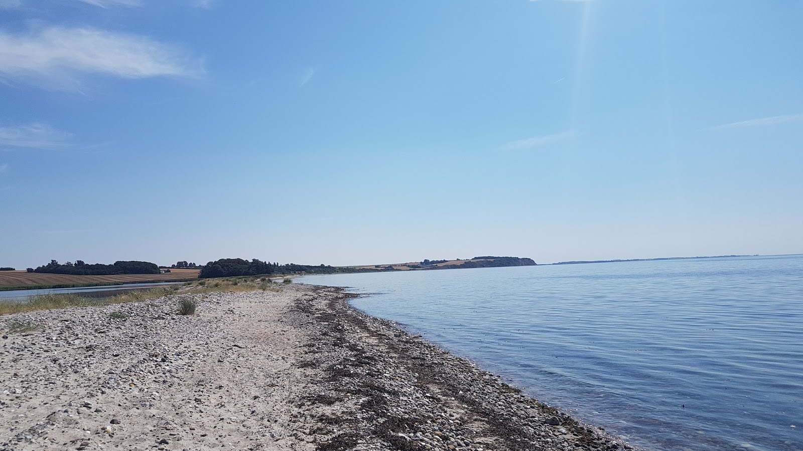 Photo of Saltofte Beach with turquoise pure water surface