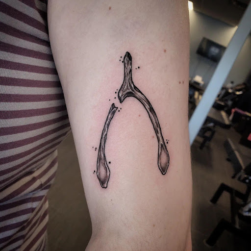 Explore c section tattoo ideas, creative tattoo ideas in Palm Harbor, available at Angry Owl Tattoo and Piercing