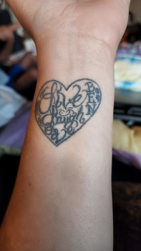 Explore january birth flower tattoo ideas, creative tattoo ideas in Mckinney, available at Borrowed Time Fine Art Gallery Tattoo Shop