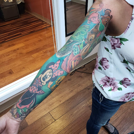 Explore bikini tattoo ideas, creative tattoo ideas in Fort Payne, available at Broken Arrow Tattoo Co.
