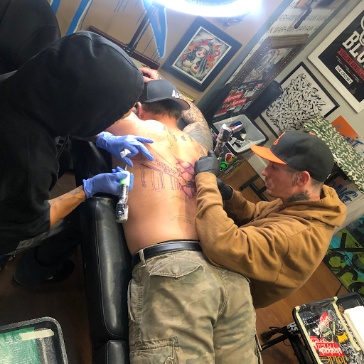 Explore black couple tattoo ideas, creative tattoo ideas in Saint Marys, available at WarHawk Tattoo Company ST MARYS