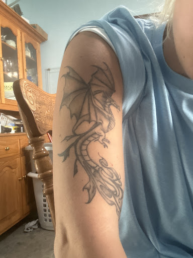 Explore pink floyd tattoo ideas, creative tattoo ideas in Medina, available at Burning River Tattoo