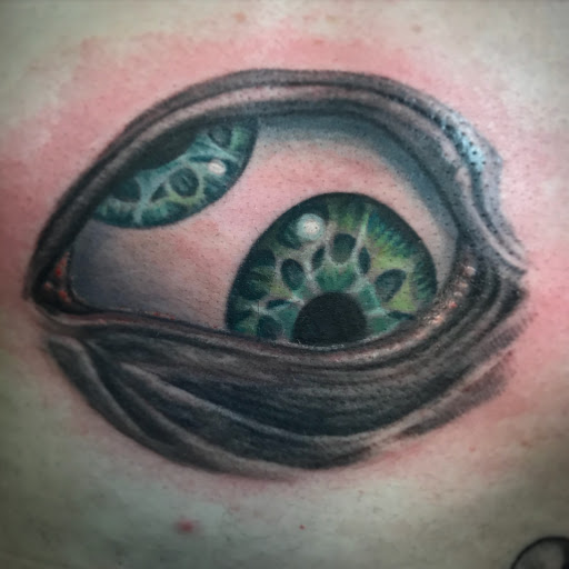 Explore men back tattoo idea, creative tattoo ideas in Tecumseh, available at Lucid Tattoo Gallery