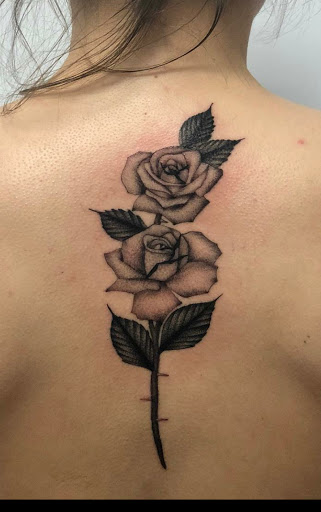 Explore dog bone tattoo ideas, creative tattoo ideas in Toledo, available at 4 Nineteen Ink