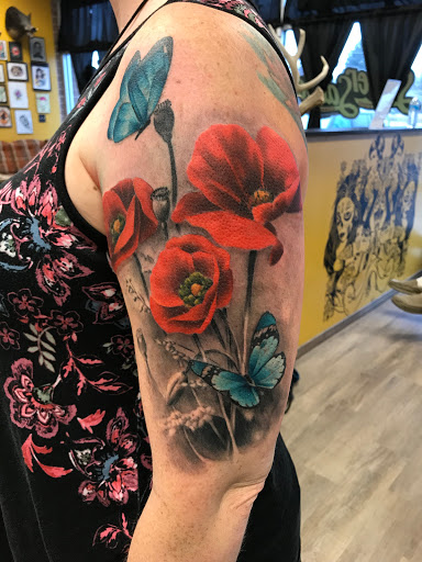 Explore la tattoo ideas, creative tattoo ideas in Channahon, available at Supersauce Tattoo Company