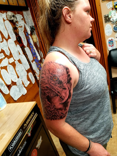 Explore phoenix bird tattoo ideas, creative tattoo ideas in Conway, available at Primal Urge Tattoos