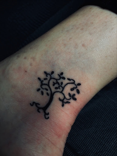 Explore mother of 4 tattoo ideas, creative tattoo ideas in North Tonawanda, available at Dark Side Ink Tattoo Studio