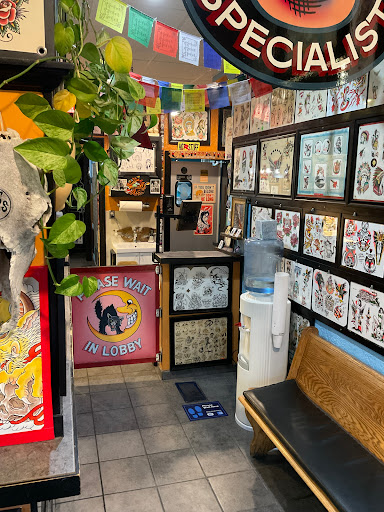 Explore quad tattoo ideas, creative tattoo ideas in Minneapolis, available at Tiger Rose Tattoo